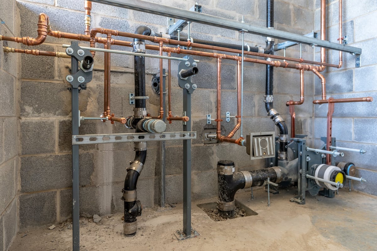 Rough-in plumbing for a new bathroom under construction
